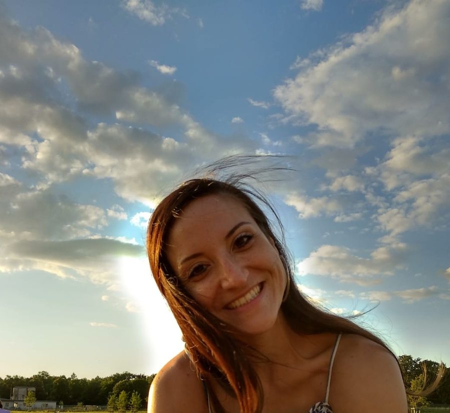 Nicole smiling at sunset
